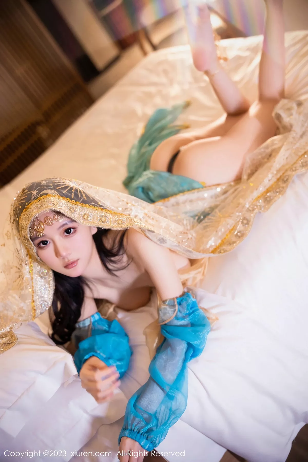 [[XiuRen秀人网]秀人网]No.7469_模特幼幼性感蓝色西域舞娘短裙露黑色内裤秀白嫩美腿诱惑写真82P